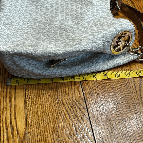 Michael Kors handbag. Vanilla color with tan straps and gold hardware. - Picture 5 of 16